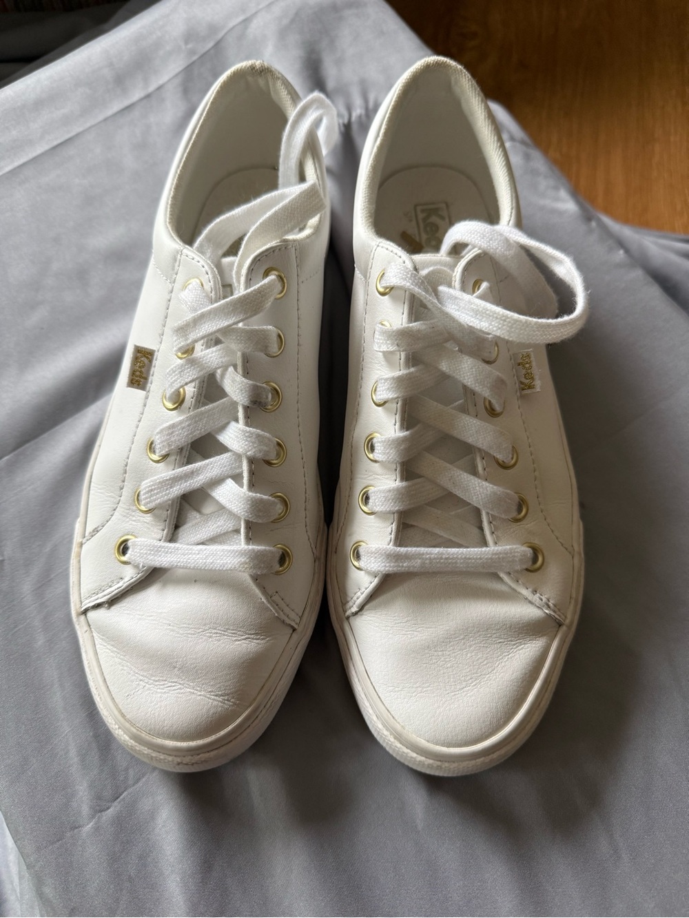 Keds White Leather Low-Top Sneakers with Gold Eyelets